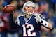 FOXBORO, MA - JANUARY 20: Tom Brady #12 of the New England Patriots looks to throw against the Baltimore Ravens during the 2013 AFC Championship game at Gillette Stadium on January 20, 2013 in Foxboro, Massachusetts. (Photo by Jim Rogash/Getty Images)