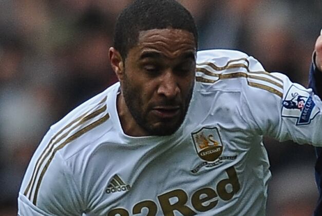 Arsenal Are to Step Up Their Interest in Swanseas Ashley Williams