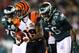 PHILADELPHIA, PA - DECEMBER 13: Brandon Tate #19 of the Cincinnati Bengals carries the ball as Akeem Jordan #56 of the Philadelphia Eagles defends on December 13, 2012 at Lincoln Financial Field in Philadelphia, Pennsylvania. (Photo by Elsa/Getty Images)