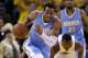 OAKLAND, CA - APRIL 26: Andre Iguodala #9 of the Denver Nuggets dribbles up court during their game against the Golden State Warriors during Game Three of the Western Conference Quarterfinals of the 2013 NBA Playoffs at ORACLE Arena on April 26, 2013 in Oakland, California. NOTE TO USER: User expressly acknowledges and agrees that, by downloading and or using this photograph, User is consenting to the terms and conditions of the Getty Images License Agreement. (Photo by Ezra Shaw/Getty Images)