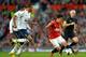 Mousa Dembele and Sandro in action against Manchester United last September. It was a performance that showed the quality of the Tottenham midfield, as well as some of its limitations.