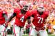 September 29, 2012; Athens, GA, USA; Georgia Bulldogs running back Keith Marshall (4) celebrates a touchdown with offensive tackle John Theus (71) in the game against the Tennessee Volunteers at Sanford Stadium. The Bulldogs won 51-44. Mandatory Credit: Daniel Shirey-USA TODAY Sports