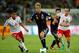 BELO HORIZONTE, BRAZIL - JUNE 22: Keisuke Honda of Japan handles the ball against Carlos Salcido and Gerardo Torrado of Mexico during the FIFA Confederations Cup Brazil 2013 Group A match between Japan and Mexico at Estadio Mineirao on June 22, 2013 in Belo Horizonte, Brazil. (Photo by Dean Mouhtaropoulos/Getty Images)