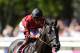 NEWMARKET, ENGLAND - JULY 11: Richard Hughes riding Montiridge win The Insure Pink Stubbs Stakes at Newmarket racecourse on July 11, 2013 in Newmarket, England. (Photo by Alan Crowhurst/Getty Images)