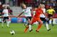 VAXJO, SWEDEN - JULY 11: Lena Goessling (L) of Germany battles for the ball with Kirsten van de Ven (R) of Netherlands during the UEFA Women's Euro 2013 group B match at Vaxjo Arena on July 11, 2013 in Vaxjo, Sweden. (Photo by Martin Rose/Getty Images)