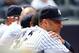 NEW YORK, NY - JULY 11: Derek Jeter #2 of the New York Yankees looks on from the dugout during the game against the Kansas City Royals on July11,2013 at Yankee Stadium in the Bronx borough of New York City. (Photo by Elsa/Getty Images)