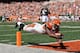 CINCINNATI, OH - SEPTEMBER 16: Brandon Tate #19 of the Cincinnati Bengals dives in to the endzone for a touchdown against the Cleveland Browns at Paul Brown Stadium on September 16, 2012 in Cincinnati, Ohio. (Photo by Jamie Sabau/Getty Images)