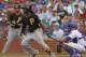 CHICAGO, IL - JULY 06: Andrew McCutchen #22 of the Pittsburgh Pirates bats against the Chicago Cubs at Wrigley Field on July 6, 2013 in Chicago, Illinois. The Cubs defeated the Pirates 4-1. (Photo by Jonathan Daniel/Getty Images)