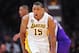 March 17, 2013; Los Angeles, CA, USA; Los Angeles Lakers small forward Metta World Peace (15) reacts to a foul called against him during the second half at Staples Center. Mandatory Credit: Gary A. Vasquez-USA TODAY Sports