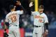 NEW YORK, NY - APRIL 13: Chris Davis #19 and Manny Machado #13 of the Baltimore Orioles celebrate the win over the New York Yankees on April 13, 2013 at Yankee Stadium in the Bronx borough of New York City.The Baltimore Orioles defeated the New York Yankees 5-3. (Photo by Elsa/Getty Images)