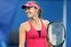 MELBOURNE, AUSTRALIA - JANUARY 21: Martina Hingis of Switzerland looks on in her first round legends doubles match with Martina Navratilova of the United States against Lindsay Davenport of the United States and Amelie Mauresmo of France during day eight of the 2013 Australian Open at Melbourne Park on January 21, 2013 in Melbourne, Australia. (Photo by Michael Dodge/Getty Images)
