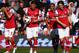 LONDON, ENGLAND - MAY 04: Theo Walcott (2nd right) of Arsenal celebrates with team mates after scoring during the Barclays Premier League match between Queens Park Rangers and Arsenal at Loftus Road on May 04, 2013 in London, England. (Photo by Clive Rose/Getty Images)