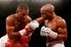 HULL, ENGLAND - JULY 13: Kell Brook in action with Carson Jones during their International Welterweight bout at Craven Park Stadium on July 13, 2013 in Hull, England. (Photo by Scott Heavey/Getty Images)