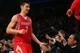 NEW YORK, NY - DECEMBER 17: Jeremy Lin #7 of the Houston Rockets is congratulated in the fourth quarter after he is pulled from the game against the New York Knicks on December 17, 2012 at Madison Square Garden in New York City. The Houston Rockets defeated the New York Knicks 109-96. NOTE TO USER: User expressly acknowledges and agrees that, by downloading and/or using this photograph, user is consenting to the terms and conditions of the Getty Images License Agreement. (Photo by Elsa/Getty Images)