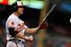 BALTIMORE, MD - JULY 9: Chris Davis #19 of the Baltimore Orioles reacts after taking a strike in the fifth inning against the Texas Rangers at Oriole Park at Camden Yards on July 9, 2013 in Baltimore, Maryland. The Texas Rangers won, 8-4. (Photo by Patrick Smith/Getty Images)