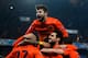 PARIS, FRANCE - APRIL 02: Gerard Pique jumps on Xavi of Barcelona as they celebrate with team mates after scoring a penalty for the teams second goal during the UEFA Champions League Quarter Final match between Paris Saint-Germain and Barcelona FCB at Parc des Princes on April 2, 2013 in Paris, France. (Photo by Dean Mouhtaropoulos/Getty Images)