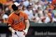 Jul 13, 2013; Baltimore, MD, USA; Baltimore Orioles first baseman Chris Davis (19) hits a solo home run in the second inning against the Toronto Blue Jays at Oriole Park at Camden Yards. Mandatory Credit: Joy R. Absalon-USA TODAY Sports