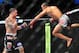Feb 2, 2013; Las Vegas, NV, USA; Frankie Edgar (left) and Jose Aldo (right) battle each other during UFC 156 at the Mandalay Bay Events Center. Mandatory Credit: Gary A. Vasquez-USA TODAY Sports