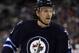 April 18, 2013; Winnipeg, MB, CAN; Winnipeg Jets defenseman Ron Hainsey (6) reacts during the first period against the Carolina Hurricanes at the MTS Centre. Mandatory Credit: Bruce Fedyck-USA TODAY Sports