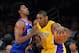 January 1, 2013; Los Angeles, CA, USA; Philadelphia 76ers shooting guard Nick Young (1) guards Los Angeles Lakers small forward Metta World Peace (15) in the first half of the game at the Staples Center. Mandatory Credit: Jayne Kamin-Oncea-USA TODAY Sports