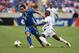 Jul 15, 2013; Houston, TX, USA; El Salvador forward Rodolfo A. Zelaya (11) and Haiti midfielder Jean M. Alexandre (16) battle for the ball during the first half at BBVA Compass Stadium. Mandatory Credit: Troy Taormina-USA TODAY Sports