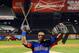 NEW YORK, NY - JULY 15: Yoenis Cespedes of the Oakland Athletics poses with the trophy after winning Chevrolet Home Run Derby on July 15, 2013 at Citi Field in the Flushing neighborhood of the Queens borough of New York City. (Photo by Mike Ehrmann/Getty Images)