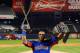 NEW YORK, NY - JULY 15: Yoenis Cespedes of the Oakland Athletics poses with the trophy after winning Chevrolet Home Run Derby on July 15, 2013 at Citi Field in the Flushing neighborhood of the Queens borough of New York City. (Photo by Mike Ehrmann/Getty Images)