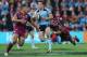 BRISBANE, AUSTRALIA - JUNE 26: Mitchell Pearce of the Blues is tackled by Johnathan Thurston of the Maroons during game two of the ARL State of Origin series between the Queensland Maroons and the New South Wales Blues at Suncorp Stadium on June 26, 2013 in Brisbane, Australia. (Photo by Chris Hyde/Getty Images)