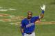 Jul 15, 2013; Flushing , NY, USA; American League player Yoenis Cespedes of the Oakland Athletics reacts after hitting the winning home run in the final round of the Home Run Derby in advance of the 2013 All Star Game at Citi Field. Mandatory Credit: Anthony Gruppuso-USA TODAY Sports