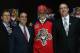 NEWARK, NJ - JUNE 30: Aleksander Barkov puts on his hat with Director of Scouting Scott Luce (R) and Assistant General Manager Michael Santos (L) after being selected number two over all in the first round by the Florida Panthers during the 2013 NHL Draft at the Prudential Center on June 30, 2013 in Newark, New Jersey. (Photo by Bruce Bennett/Getty Images)