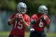 Jun 11, 2013; Alameda, CA, USA; Oakland Raiders quarterbacks Matt Flynn (15) and Terrelle Pryor (6) throw passes at minicamp at the Raiders Practice Facility. Mandatory Credit: Kirby Lee-USA TODAY Sports