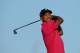 GULLANE, SCOTLAND - JULY 16: Tiger Woods of the United States hits a shot ahead of the 142nd Open Championship at Muirfield on July 16, 2013 in Gullane, Scotland. (Photo by Stuart Franklin/Getty Images)