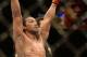 Apr 20, 2013; San Jose, CA, USA; Benson Henderson celebrates after defeating Gilbert Melendez (not pictured) during the lightweight championship bout of the UFC on Fuel TV at HP Pavilion. Mandatory Credit: Kyle Terada-USA TODAY Sports