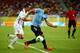RECIFE, BRAZIL - JUNE 23: Luis Suarez of Uruguay competes against Edson Lemaire of Tahiti during the FIFA Confederations Cup Brazil 2013 Group B match between Uruguay and Tahiti at Arena Pernambuco on June 22, 2013 in Recife, Brazil. (Photo by Laurence Griffiths/Getty Images)