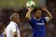 BANGKOK, THAILAND - JULY 17: Branislav Ivanovic throws the ball while Jose Mourinho of Chelsea looks on during the international friendly match between Chelsea FC and the Singha Thailand All-Star XI at the Rajamangala Stadium in Bangkok, Thailand on July 17, 2013 in Bangkok, Thailand. (Photo by Stanley Chou/Getty Images)