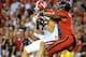 LINCOLN, NE - SEPTEMBER 29: Wide receiver Jared Abbrederis #4 of the Wisconsin Badgers catches a long pass in front of corner back Josh Mitchell #5 of the Nebraska Cornhuskers during their game at Memorial Stadium on September 29, 2012 in Lincoln, Nebraska. (Photo by Eric Francis/Getty Images)