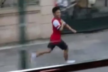 Arsenal Super-Fan Meets Team After Chasing Team Bus for Five Miles