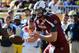 TAMPA, FL - JANUARY 1: Quarterback Connor Shaw #14 of the South Carolina Gamecocks sets to hand off in the first quarter against the Michigan Wolverines in the Outback Bowl January 1, 2013 at Raymond James Stadium in Tampa, Florida. (Photo by Al Messerschmidt/Getty Images)