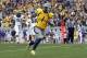 MORGANTOWN, WV - NOVEMBER 03: Tavon Austin #1 of the West Virginia Mountaineers catches a forty three yard touchdown pass against the TCU Horned Frogs during the game on November 3, 2012 at Mountaineer Field in Morgantown, West Virginia. (Photo by Justin K. Aller/Getty Images)