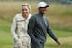 GULLANE, SCOTLAND - JULY 15: Tiger Woods of the United States smiles alongside skier Lindsey Vonn ahead of the 142nd Open Championship at Muirfield on July 15, 2013 in Gullane, Scotland. (Photo by Andy Lyons/Getty Images)