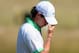 GULLANE, SCOTLAND - JULY 18: Rory McIlroy of Northern Ireland looks dejected on the 14th hole during the first round of the 142nd Open Championship at Muirfield on July 18, 2013 in Gullane, Scotland. (Photo by Stuart Franklin/Getty Images)