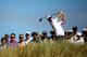 GULLANE, SCOTLAND - JULY 18: Zach Johnson of the United States tees off on the 14th hole during the first round of the 142nd Open Championship at Muirfield on July 18, 2013 in Gullane, Scotland. (Photo by Matthew Lewis/Getty Images)