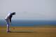 GULLANE, SCOTLAND - JULY 19: Dustin Johnson of the United States putts on the 11th hole during the second round of the 142nd Open Championship at Muirfield on July 19, 2013 in Gullane, Scotland. (Photo by Rob Carr/Getty Images)
