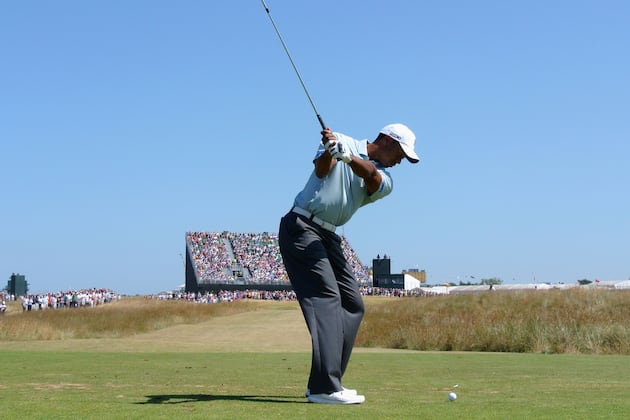 Tiger Woods Moves Up Leaderboard at British Open, Jokes with Media