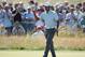GULLANE, SCOTLAND - JULY 19: Tiger Woods of the United States reacts after making a birdie on the 3rd hole during the second round of the 142nd Open Championship at Muirfield on July 19, 2013 in Gullane, Scotland. (Photo by Andy Lyons/Getty Images)