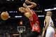 Dec 28, 2012; San Antonio, TX, USA; Houston Rockets guard Jeremy Lin (7) is fouled by San Antonio Spurs guard Tony Parker (9) during the first half at the AT&T Center. Mandatory Credit: Soobum Im-USA TODAY Sports