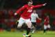 MANCHESTER, ENGLAND - JANUARY 26: Wayne Rooney of Manchester United in action during the FA Cup with Budweiser Fourth Round match between Manchester United and Fulham at Old Trafford on January 26, 2013 in Manchester, England. (Photo by Clive Mason/Getty Images)