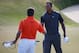 GULLANE, SCOTLAND - JULY 20: Tiger Woods of the United States shakes hands with Lee Westwood of England after finishing the third round of the 142nd Open Championship at Muirfield on July 20, 2013 in Gullane, Scotland. (Photo by Rob Carr/Getty Images)