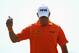 GULLANE, SCOTLAND - JULY 20: Lee Westwood of England reacts after making an eagle putt on the 5th hole during the third round of the 142nd Open Championship at Muirfield on July 20, 2013 in Gullane, Scotland. (Photo by Matthew Lewis/Getty Images)