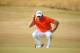 GULLANE, SCOTLAND - JULY 20: Lee Westwood of England lines up a putt on the 18th green during the third round of the 142nd Open Championship at Muirfield on July 20, 2013 in Gullane, Scotland. (Photo by Andrew Redington/Getty Images)